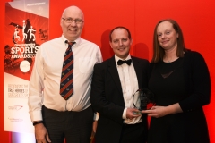 LtoR Sports Production Editor at Gloucestershire Reach PLC Mark Halliwell Presents the Coach of the Year Award to Dan Gill and Steph Gill. Gloucestershire Sports Awards 2018Cheltenham Racecourse, Evesham Rd, Cheltenham.